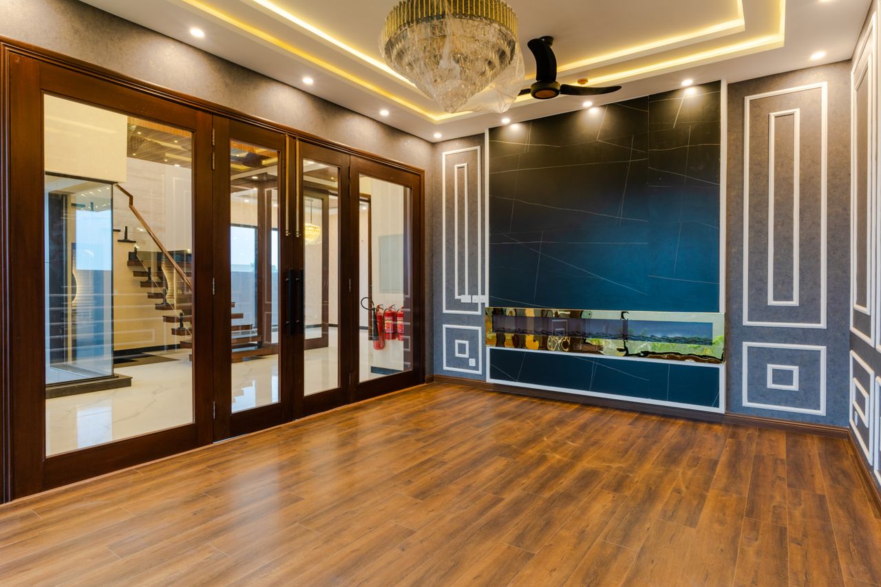 The Art of Drawing Readers In: Your attractive post title goes here Luxurious interior showcasing elegant design with chandeliers, wooden flooring, and modern decor.